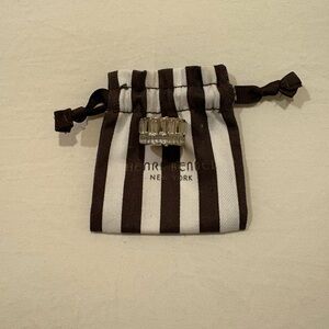 Henri Bendel Clear Stone and gold tone ring with Designer Pouch.
